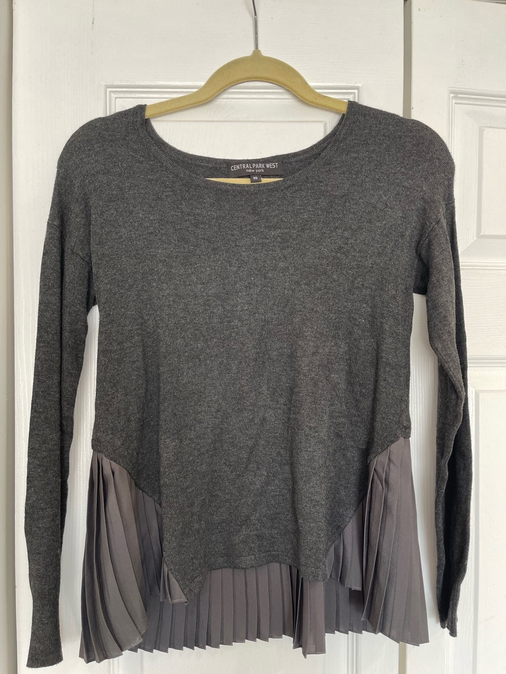 Central Park West Gray Pleated
Hem Sweater